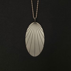 Oval sun pendant